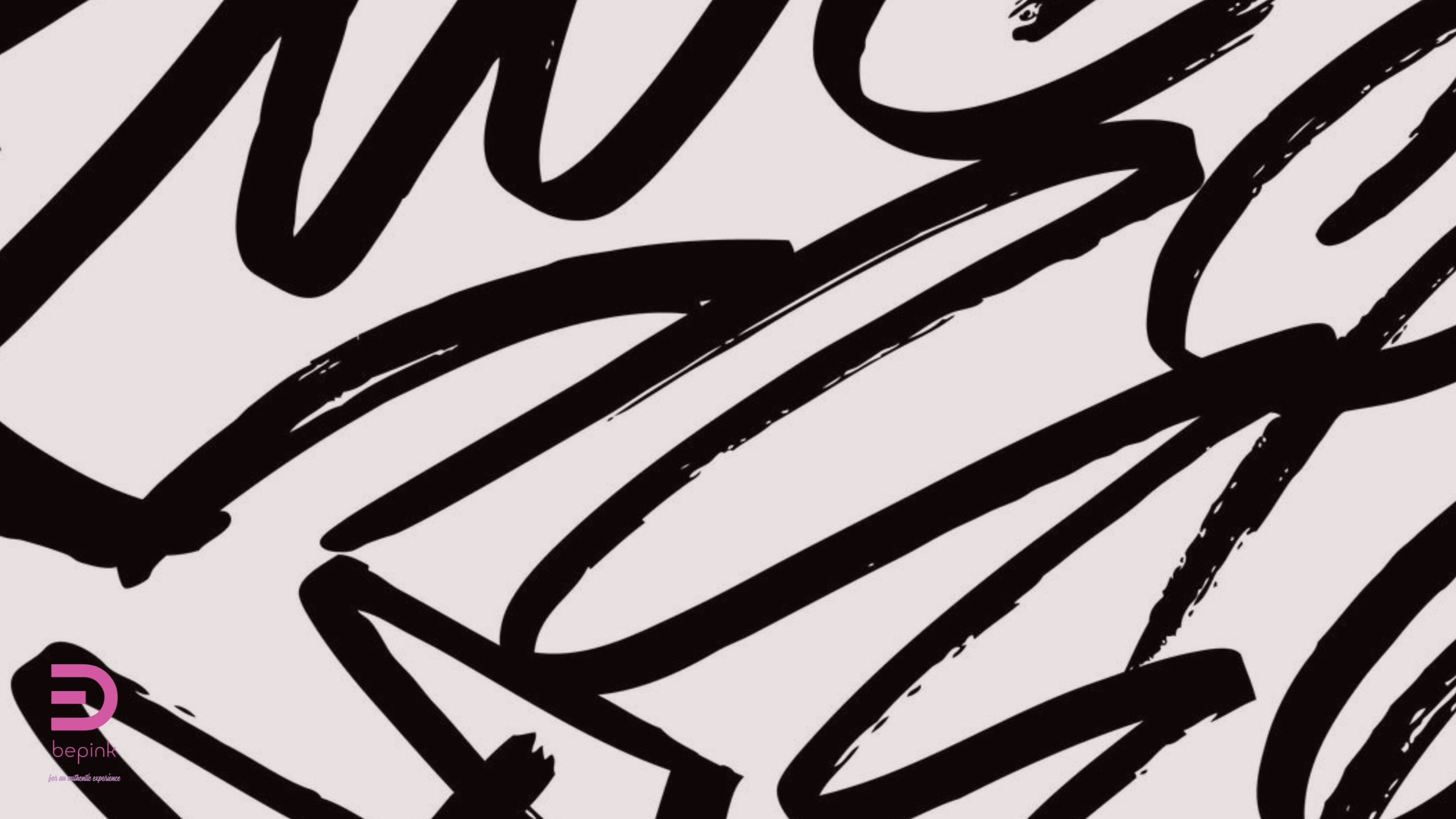 Bold black brushstrokes on a pale background, forming an abstract, gestural mark that evokes movement and the raw impulse before thought takes shape.